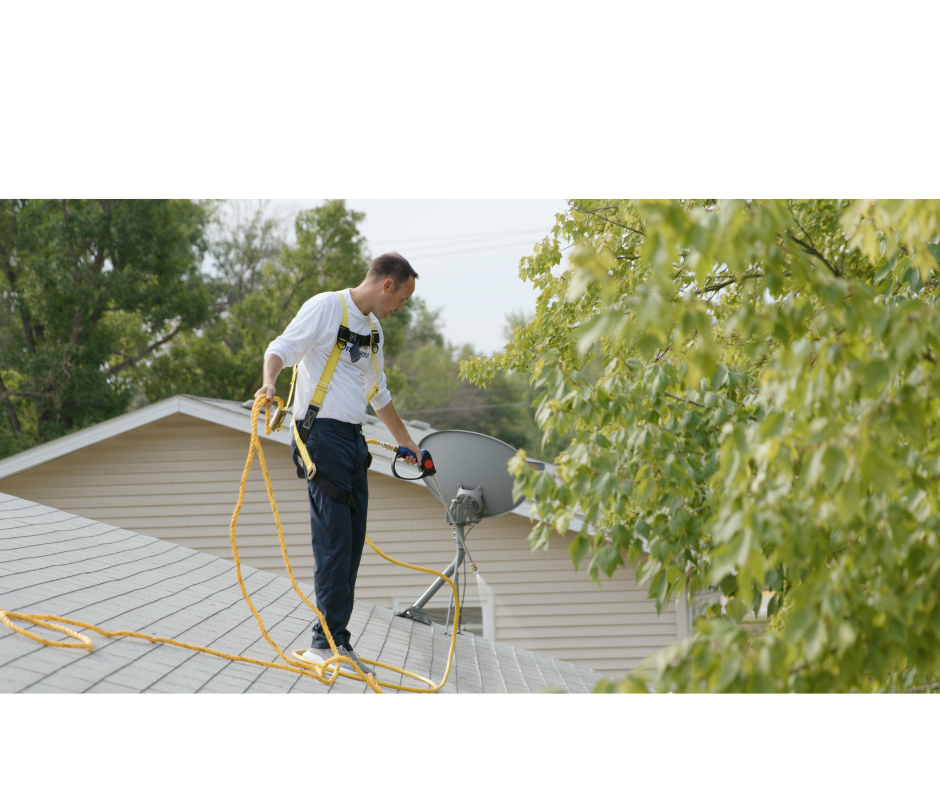 HCS Roof Rejuvenation team member on a Hutchinson rooftop